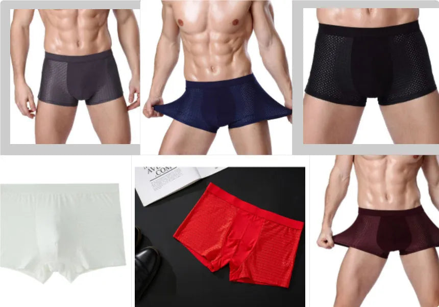 Man wearing dark blue ice silk modal boxer briefs with a U convex design and mid waist fit.