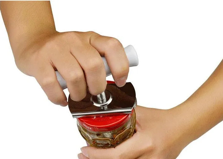 White stainless steel adjustable bottle opener with gear mechanism and PP anti-skid handle on a surface