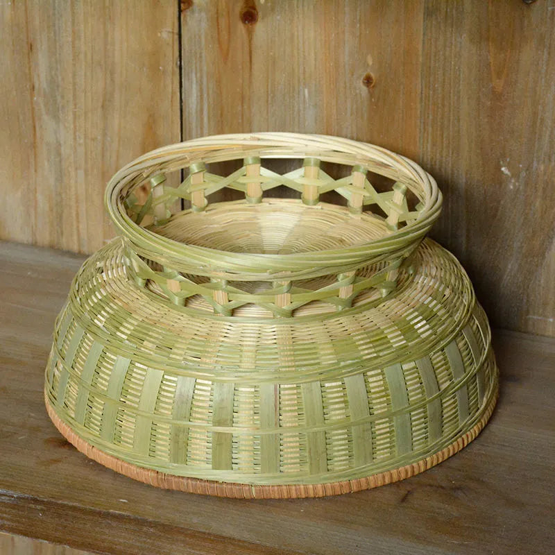 Handmade bamboo storage basket with woven construction in three size options