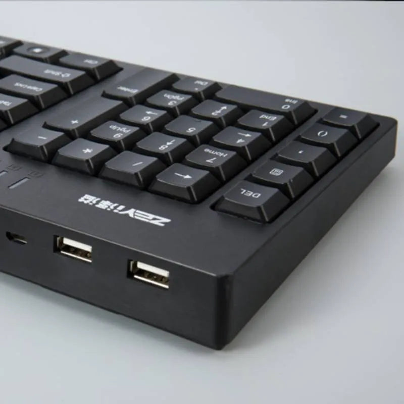 Wired USB keyboard in black with full-size layout and backlit keys