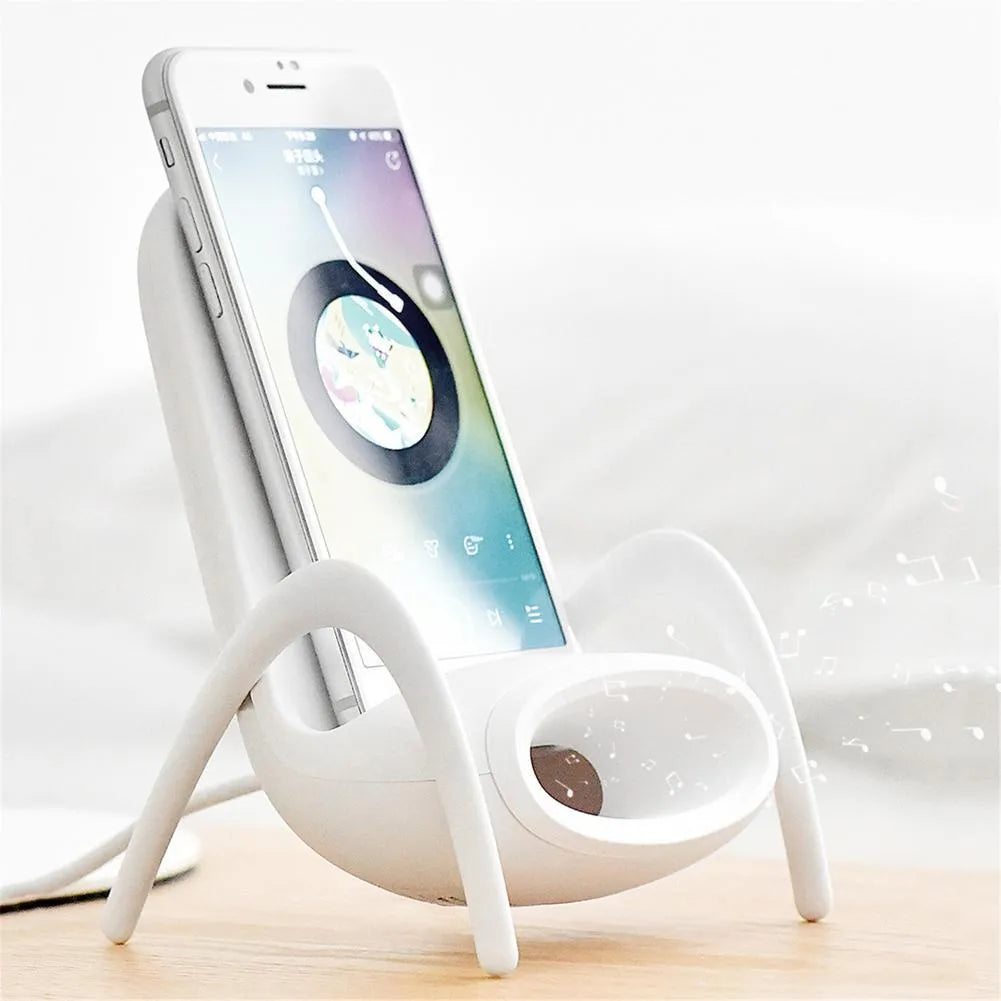 White portable mini chair wireless charger stand with Type-C input and Qi fast charge capability on a desk