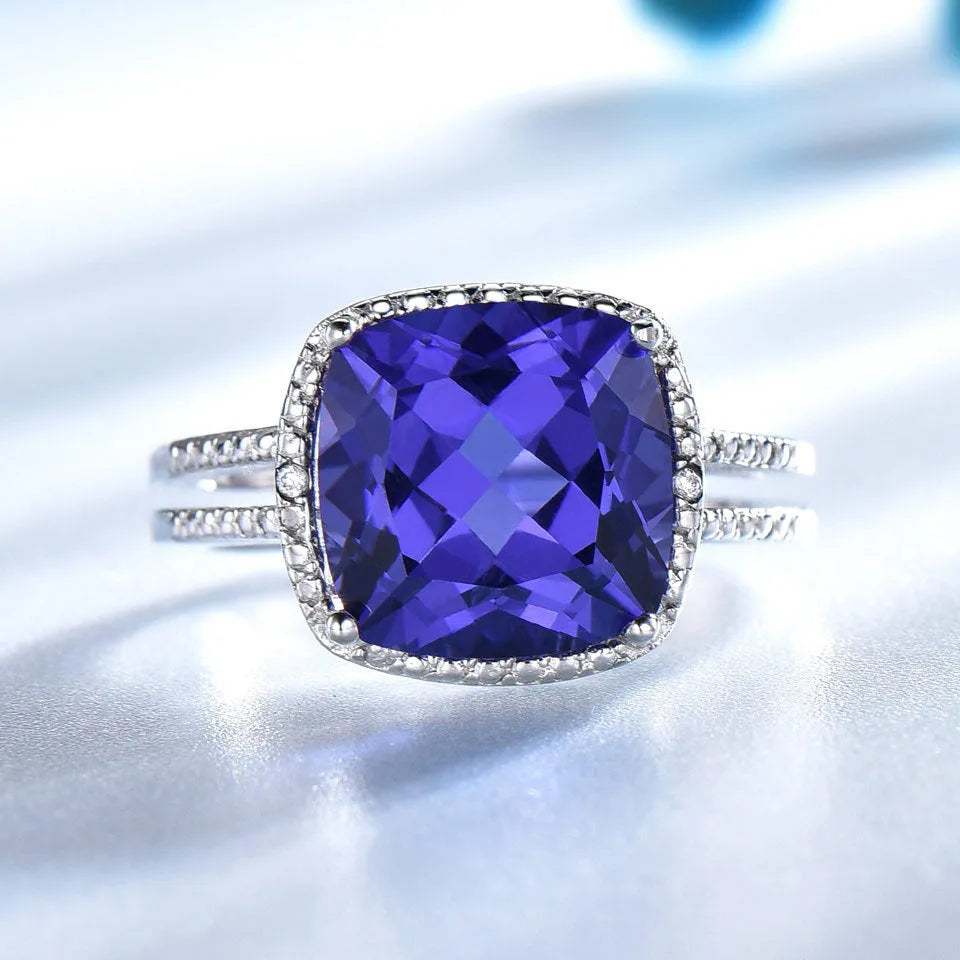 925 Sterling Silver women's ring with blue Tanzanite gemstone on a silver band