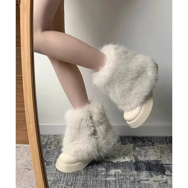 Women's low-top snow boots with artificial plush uppers, waterproof rubber soles, available in black and white colours
