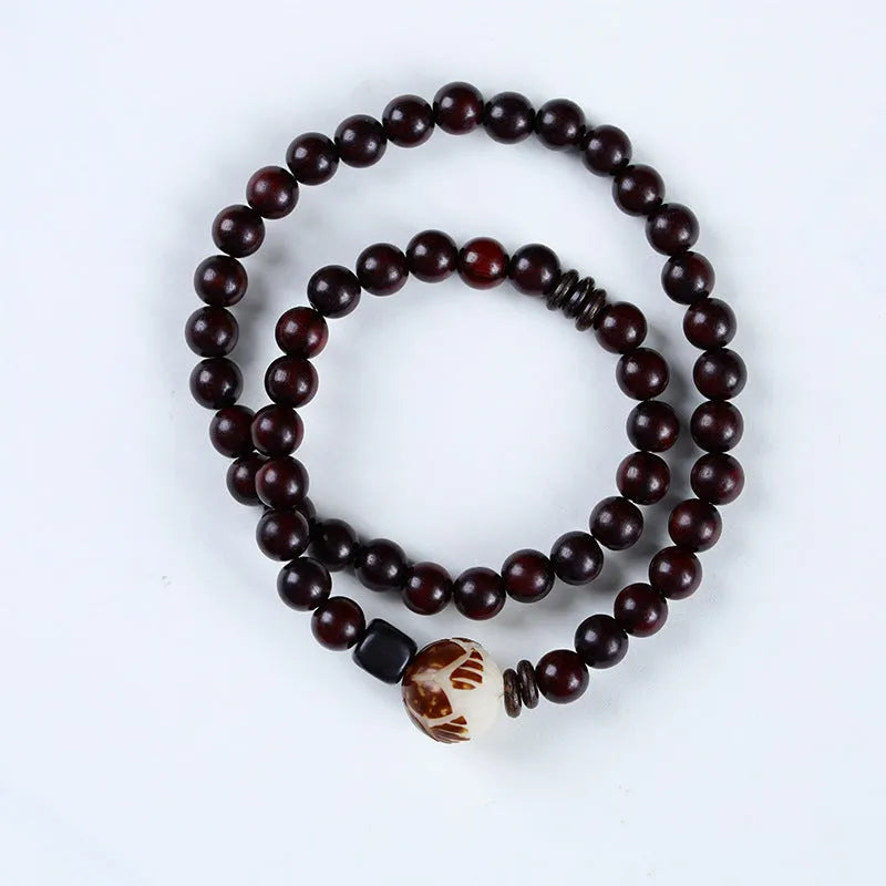 Natural rosewood double-ring bracelet with hand-knitted construction and flower-shaped beads