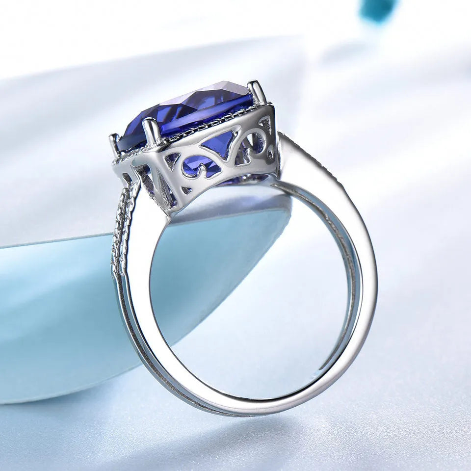 925 Sterling Silver women's ring with blue Tanzanite gemstone on a silver band