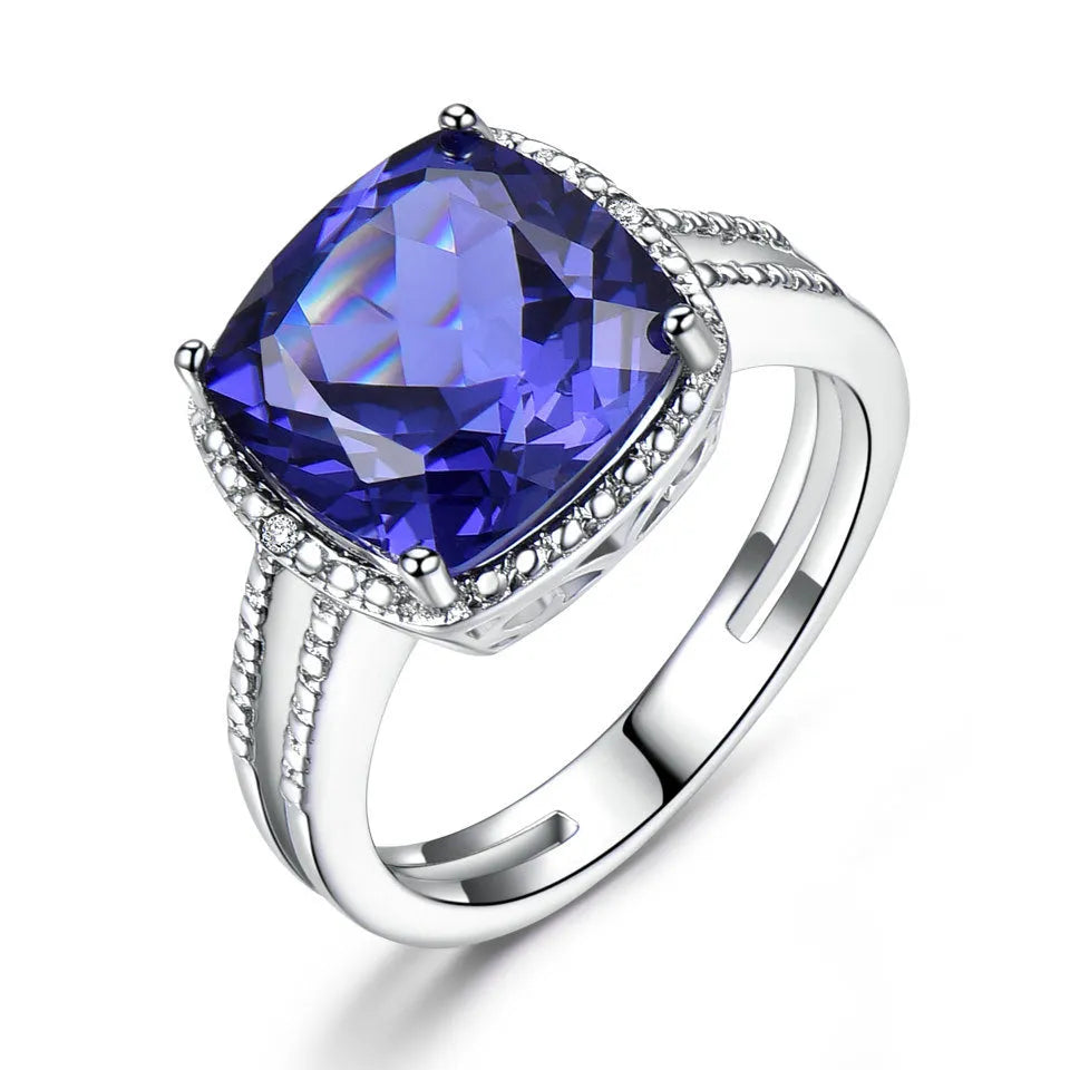 925 Sterling Silver women's ring with blue Tanzanite gemstone on a silver band