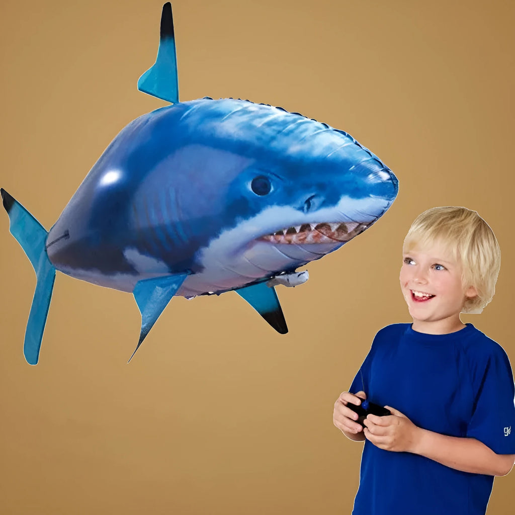 Large remote control shark inflatable balloon flying indoors with infrared controller.