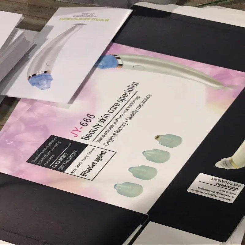 Electric blackhead suction instrument in rose gold or white for facial and nasal pore cleansing.