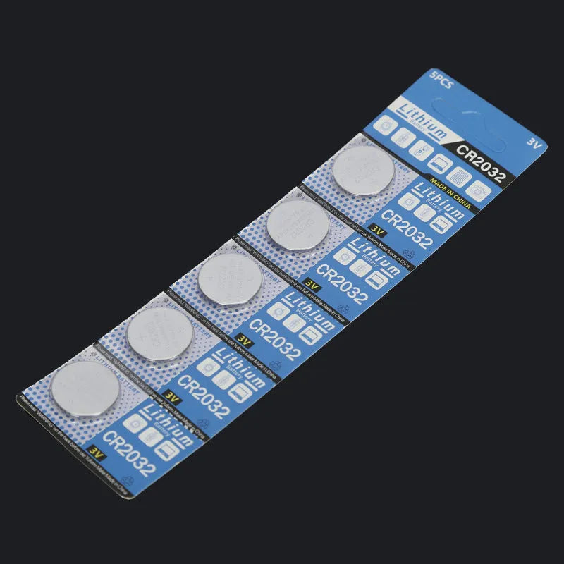 Five CR2032 3V lithium button batteries on a blister card for electronic scales and remotes