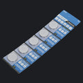 Five CR2032 3V lithium button batteries on a blister card for electronic scales and remotes