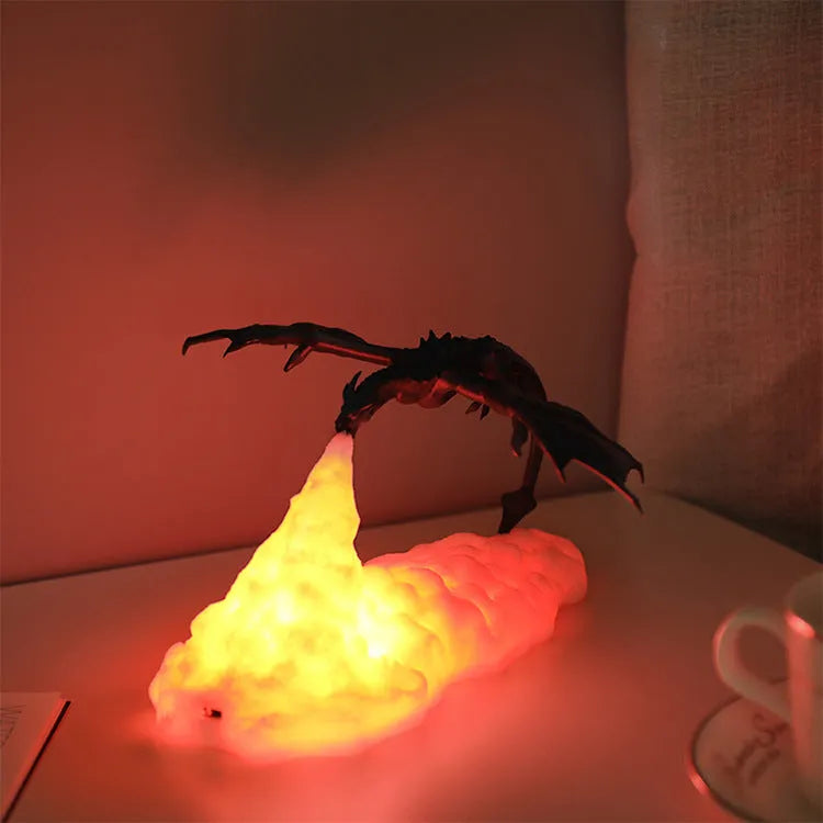3D printed red dragon night light with fire-breathing LED glow on a dark surface