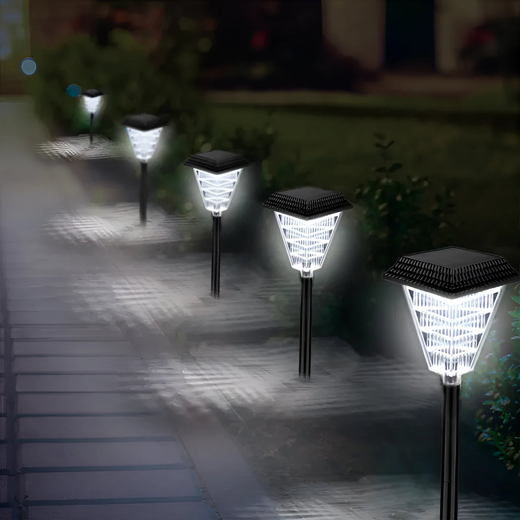 Solar garden light TS-S5103 with 12 LED and six colour modes in an outdoor garden setting