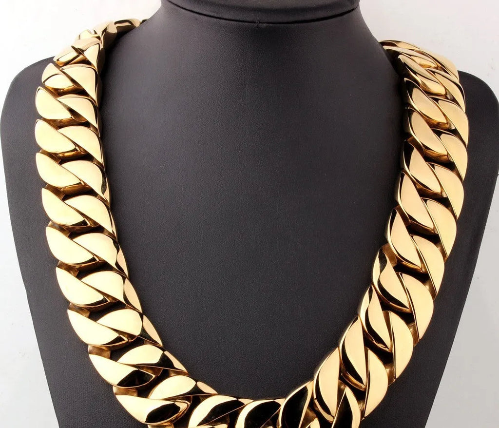 Men's gold titanium steel vacuum plating casting necklace with geometric whip chain design on white background