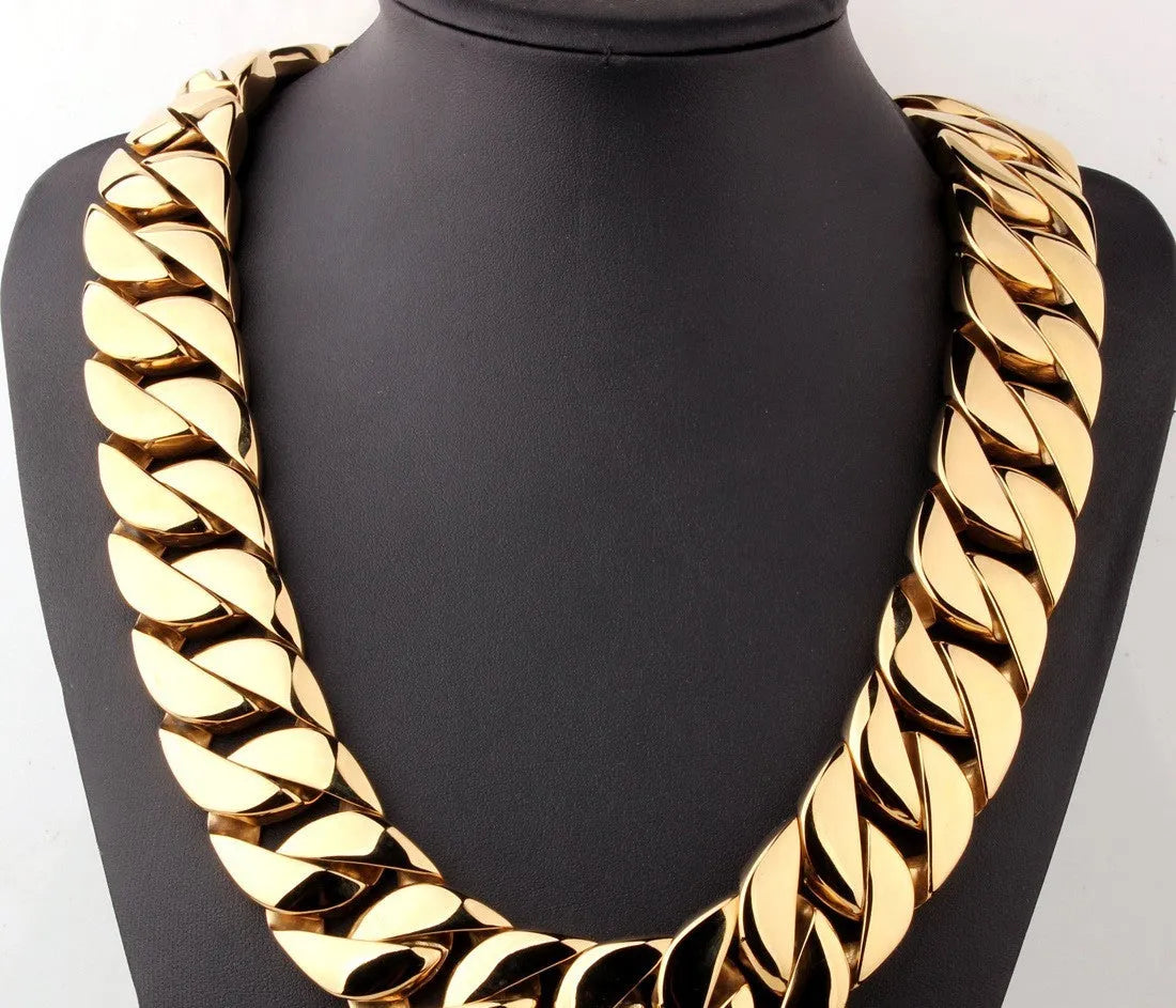 Men's gold titanium steel vacuum plating casting necklace with geometric whip chain design on white background