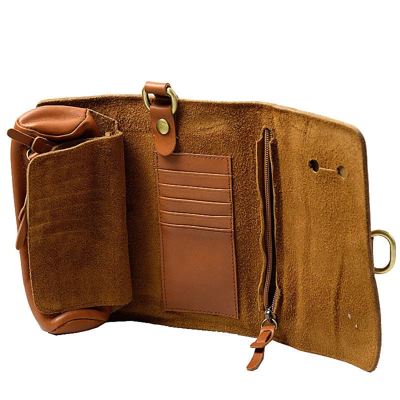 Handmade vintage style leather wallet in black, showing tape extraction closure.