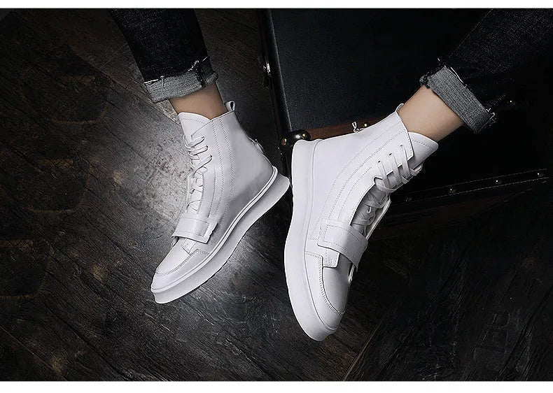 Man wearing black PU leather ankle boots in a high-top sneakers style for winter.