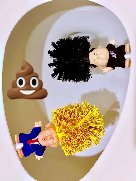 Yellow plastic Donald Trump toilet brush with handle slot, 40cm length, on white background
