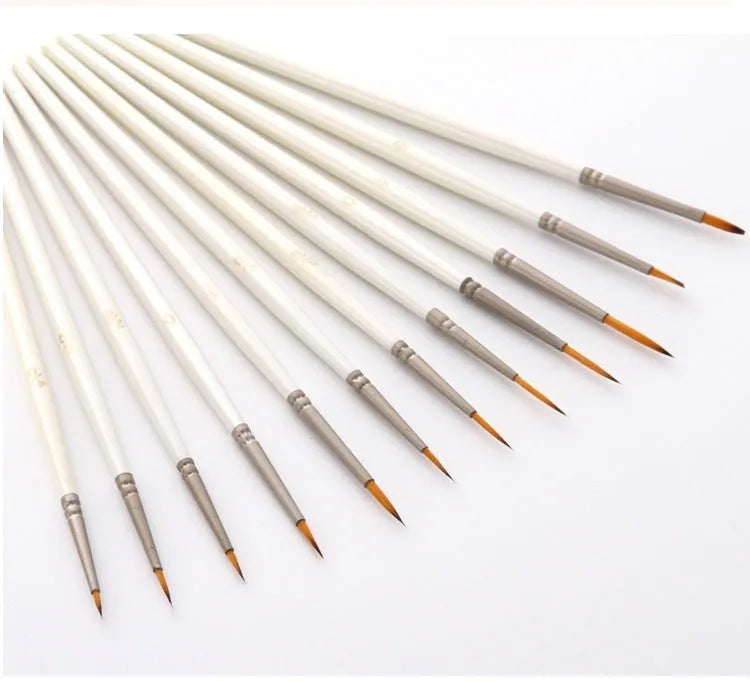 Set of 12 Pearl White handled artist paint brushes with nylon wool heads, sizes 000 to 4/0.