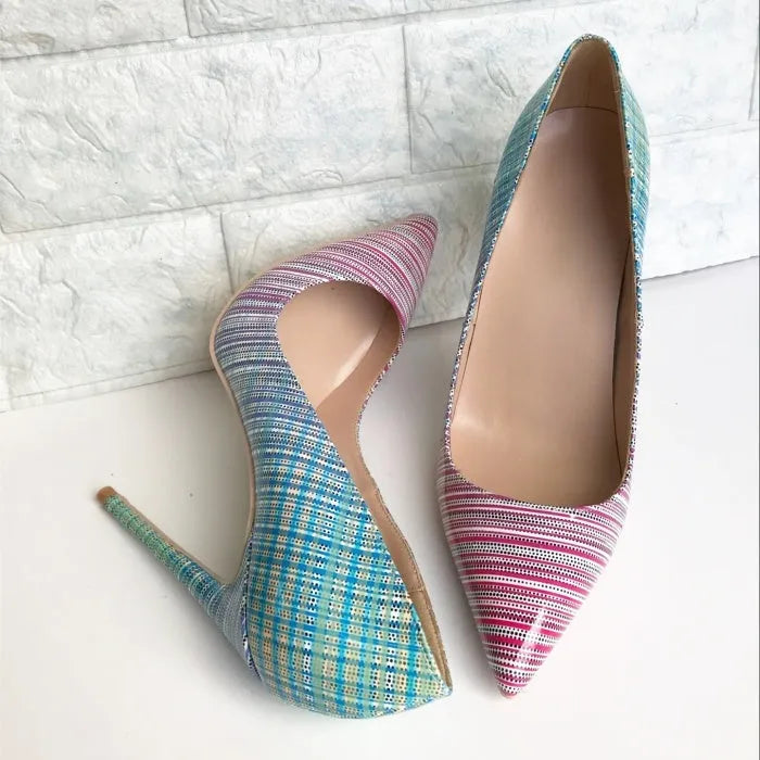Ladies pointed-toe high heels in a pink to blue gradient patent leather with a rubber sole.
