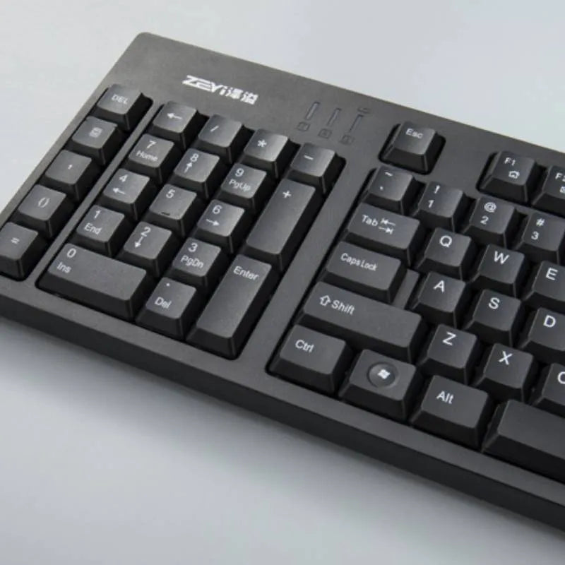 Wired USB keyboard in black with full-size layout and backlit keys