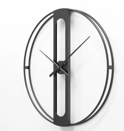 Round metal wall clock with 50 cm diameter in black or gold finish on a plain wall