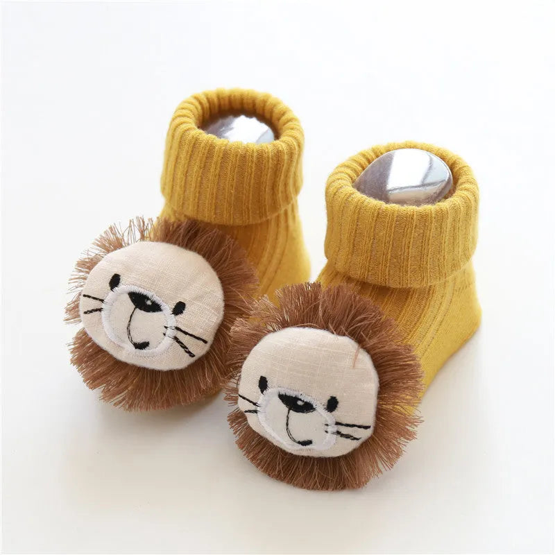 Cotton baby floor socks in multiple patterns including blue bow and lion designs