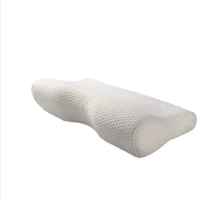 Blue memory cotton butterfly cervical pillow with polyester cover on a bed
