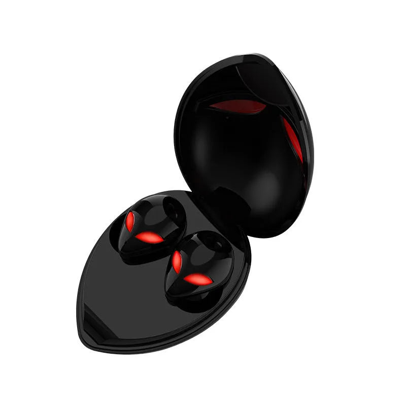 Creative Outer T8 Starman alien design wireless Bluetooth earphones in black and white with charging case.
