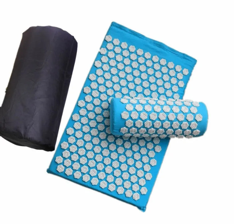Lotus acupressure mat set with pillow and cloth carry bag on floor