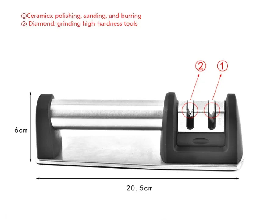 New kitchen sharpener made of black ABS plastic on a surface, manual knife sharpening tool