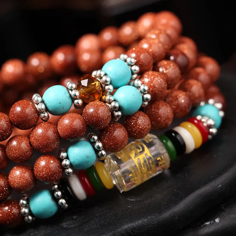 Golden star stone bracelet ornament with 108 nugget pieces and multi-circle design featuring fu character
