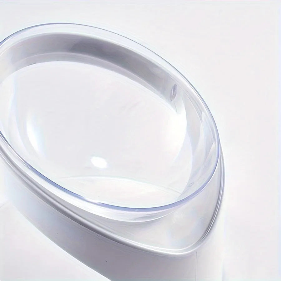 Clear plastic elevated cat food bowl with 15-degree tilt angle on white background