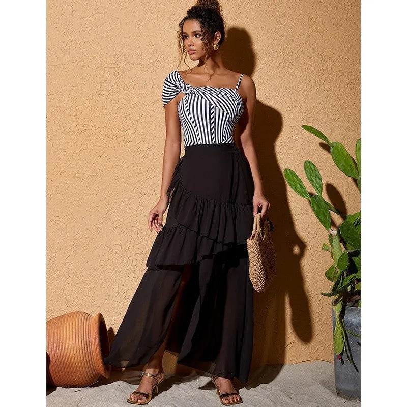 Women's one-piece ruffled striped swimsuit with black skirt in polyester fabric