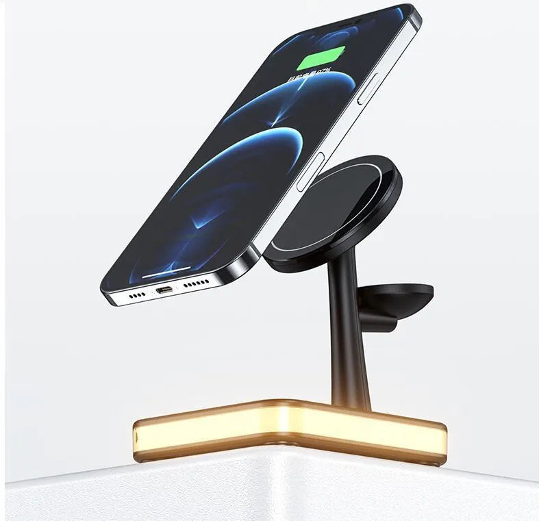 Three-in-one magnetic wireless charger with night light holding an iPhone, Apple Watch, and AirPods on a desk
