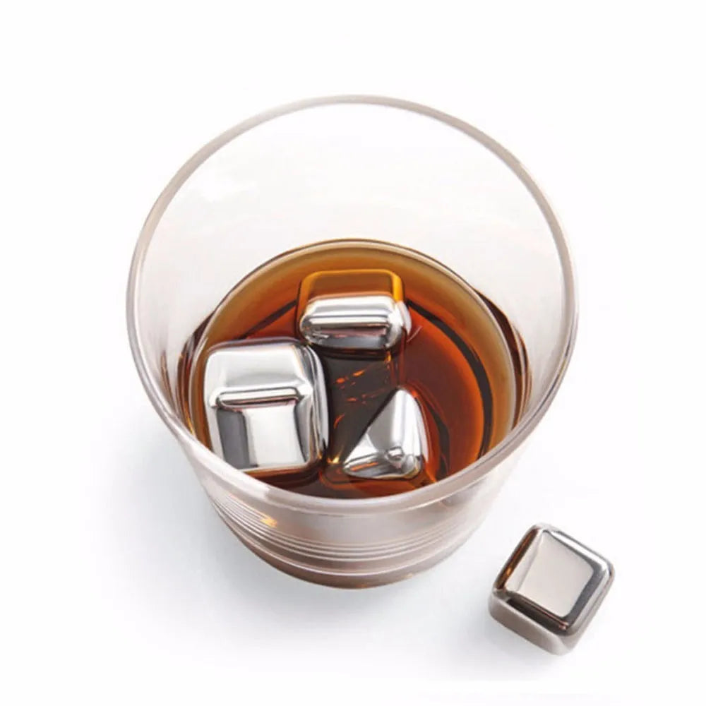 8-piece stainless steel whiskey stones set with tongs in plastic box, various shapes including squares and diamonds