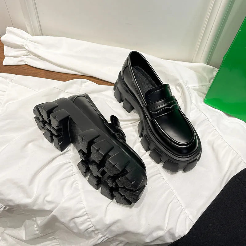 British style wide fit loafers in patent leather or matte finish with rubber sole and shallow opening