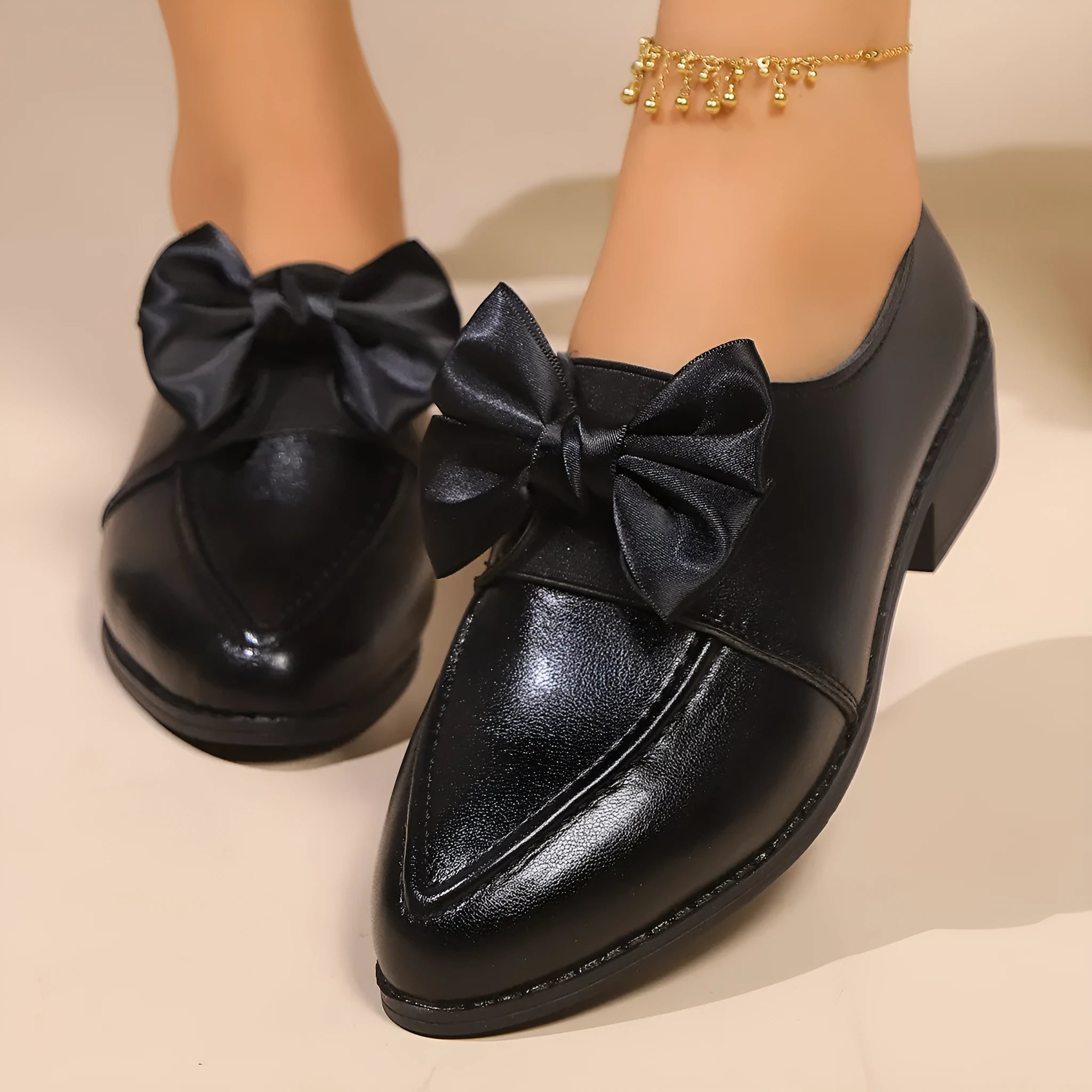 Women's British-style leather shoes with decorative bow detailing on PU upper and rubber sole