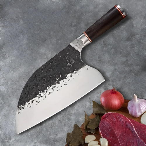 5CR15MOV stainless steel kitchen knife with ebony wood handle on cutting board for meat and bone slicing