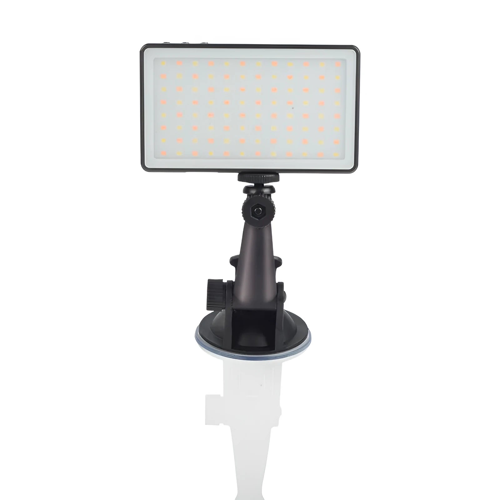 Black aluminium alloy portable LED ring light for laptop video conferencing on a desk.