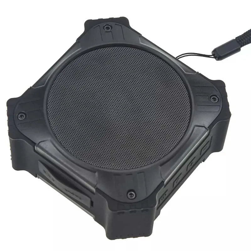 Black waterproof portable Bluetooth speaker with wrist strap showing compact 101x101x47mm size