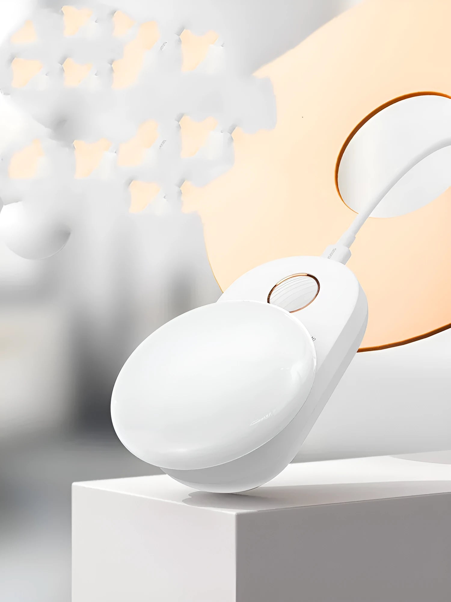 White rechargeable night light with motion sensor and LED illumination for bedside use
