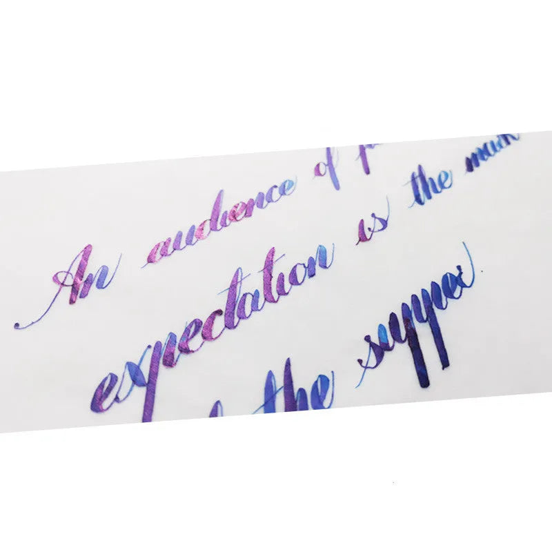 Bottle of gradient colour fountain pen ink with gold powder sheen in red tide or truffle colour