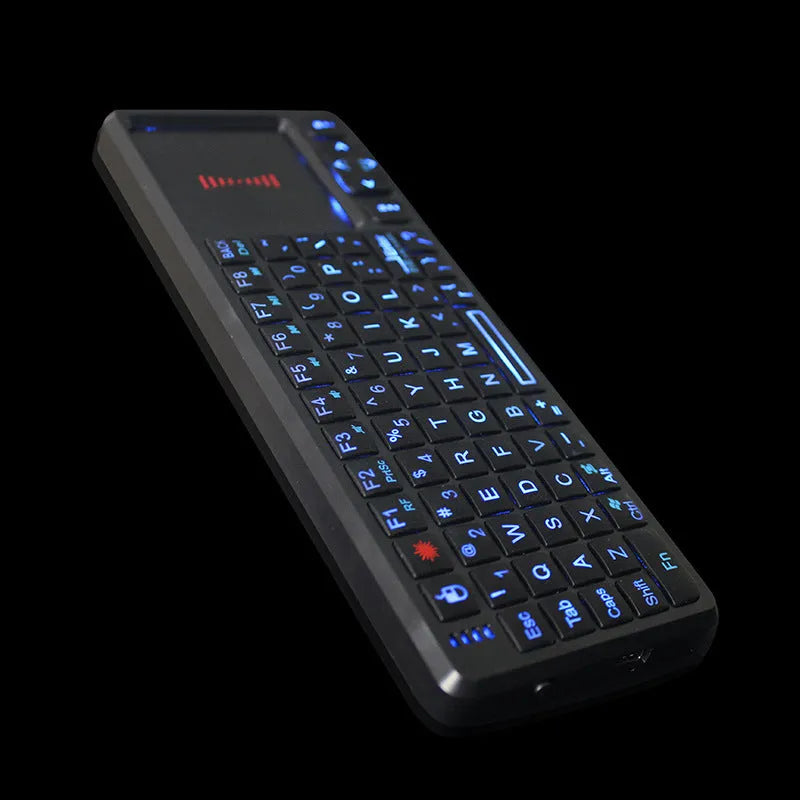 Black wireless mini keyboard with touch screen and matching mouse for teaching presentations