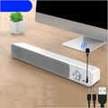 G18 black and white desktop computer speakers with USB cable showing compact size