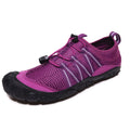 Unisex low-cut water shoes with elastic band closure in black, grey, blue, or purple.