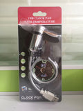 USB clock temperature fan with LED display, soft plastic blades, and flexible silver metal neck on a desk