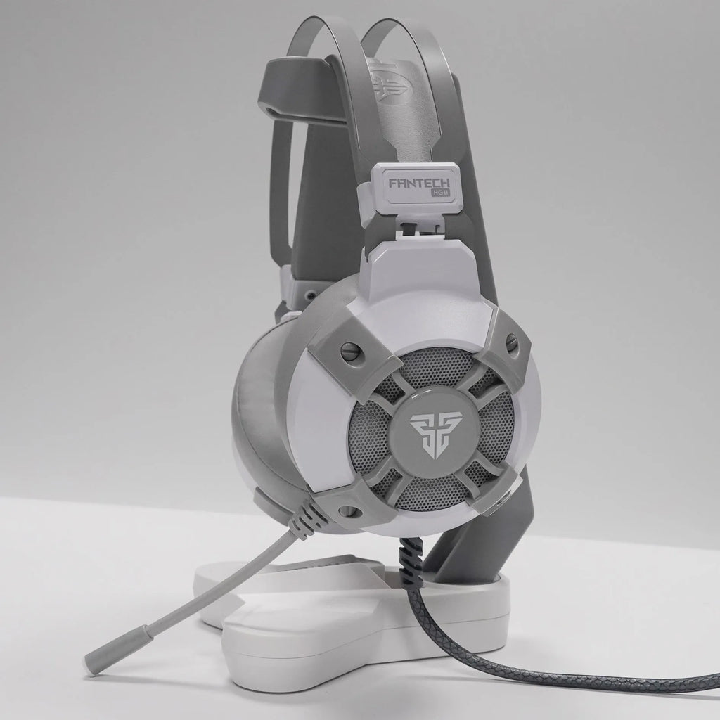 Black FANTECH HG11 USB gaming headset with large ear cups and an inline remote control on the cable.