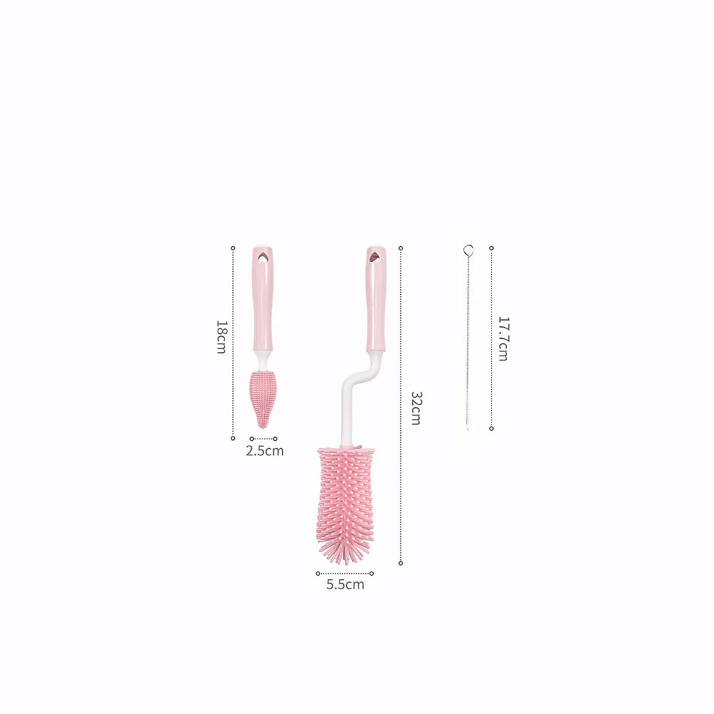 Three-piece silicone baby bottle brush set in pink, blue, and yellow with straw cleaning tool