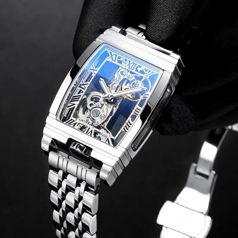 Daystar square dial manual mechanical watch with stainless steel case on a leather strap.