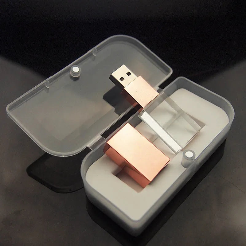 Crystal USB flash drive with transparent glass and stainless steel shell, gold colour, USB 2.0 connector visible